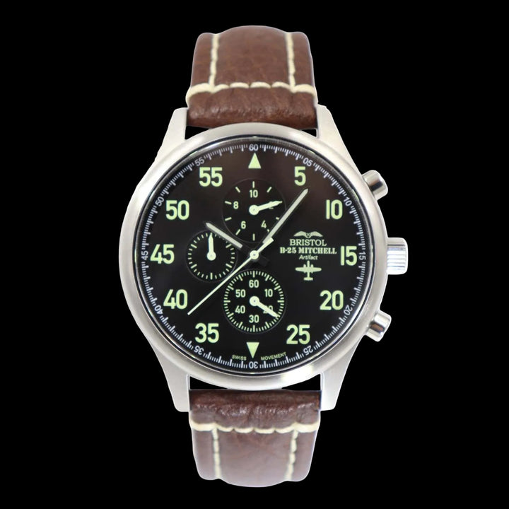 B-25 Mitchell tribute watch with stainless steel brushed case, black dial, and brown leather stitched band