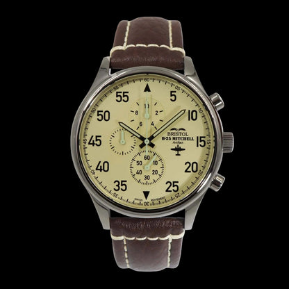 B-25 Mitchell tribute watch with polished stainless steel case, beige dial, and brown leather strap