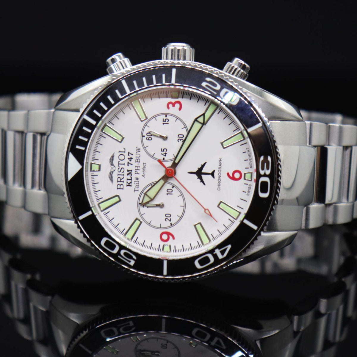 747 Tribute watch with stainless steel case and white dial featuring KLM 747 airframe artifact