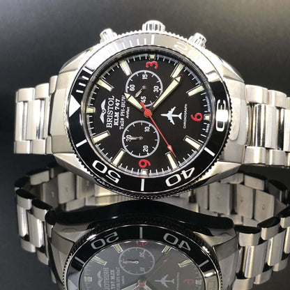 747 Tribute stainless steel watch with black dial and KLM 747 airframe artifact