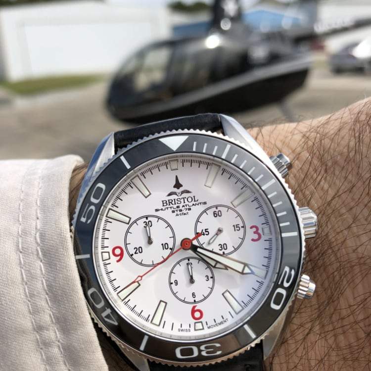 747 Tribute stainless steel watch with white dial and KLM 747 airframe artifact