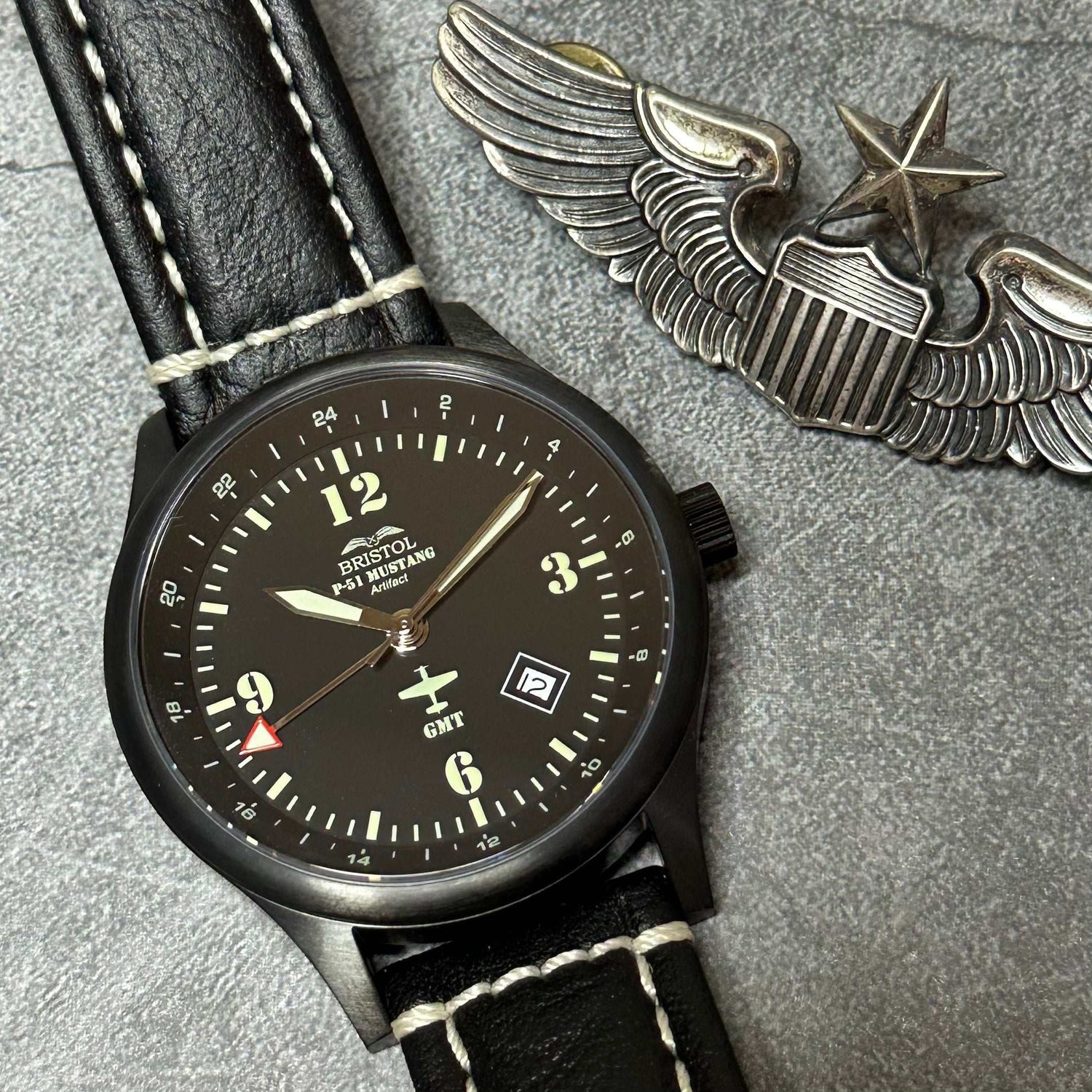 Black P-51 Mustang tribute watch with leather band and Swiss quartz movement and GMT function