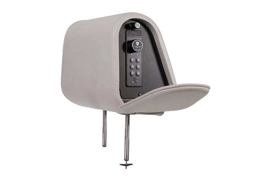 The Vulcan Headrest Safe steel lockbox installed on a truck headrest with biometric and keypad access