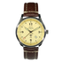 P-51 Mustang Tribute watch with polished stainless steel case, beige dial, and brown leather strap