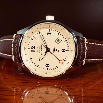 P-51 Mustang Tribute watch with beige dial, polished stainless steel case, and brown leather strap