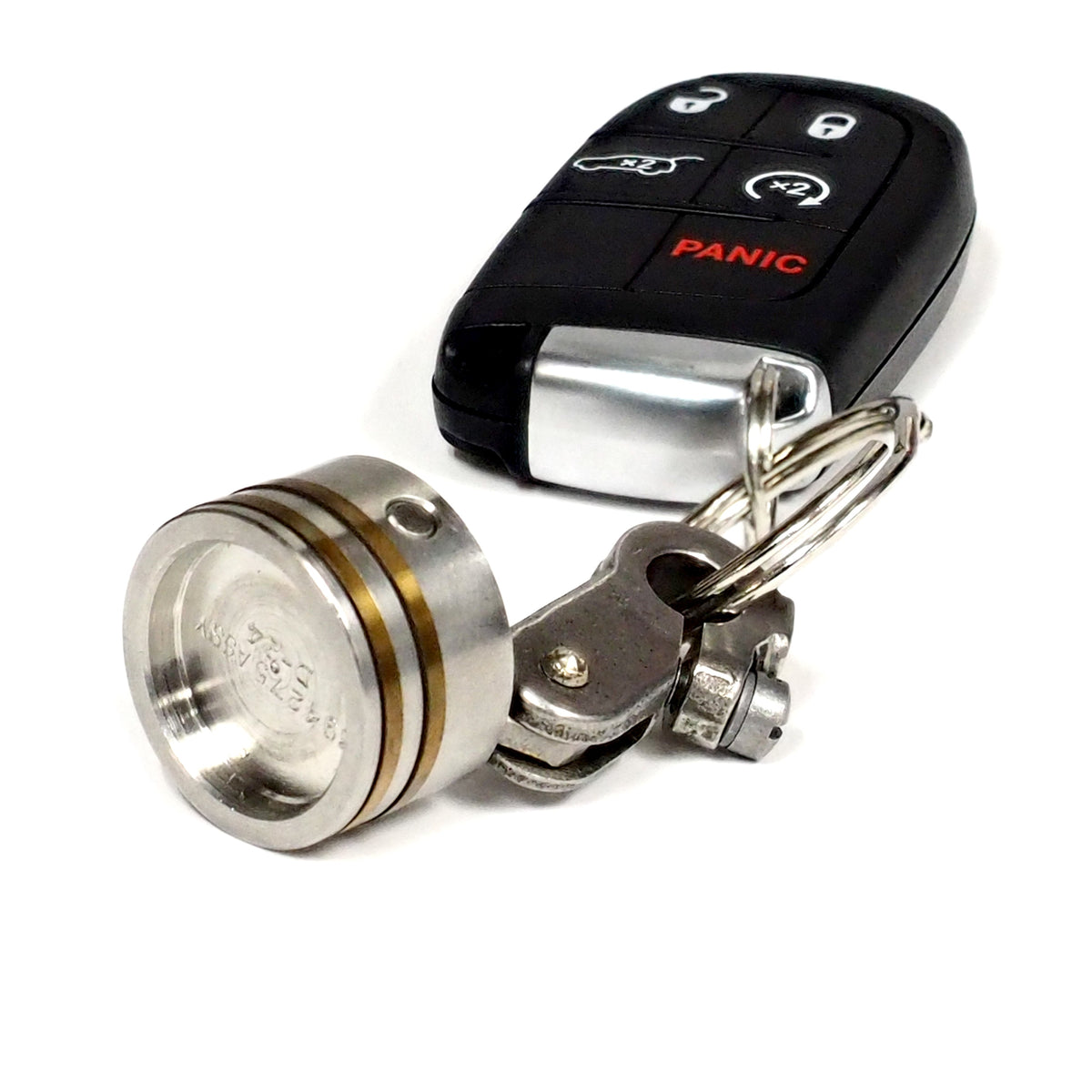 Car key fob with a metallic keychain on a white background