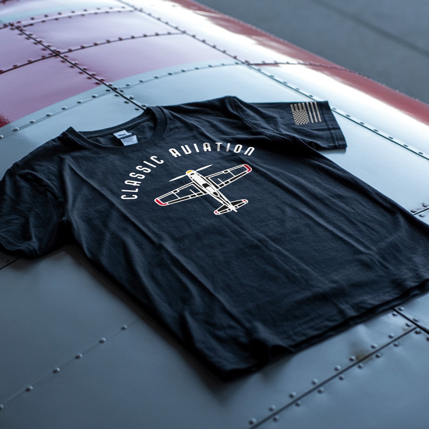 Black t-shirt with airplane design and &