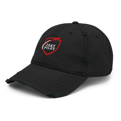Test Pilot Aviation Hat with distressed brim and logo on a black background.