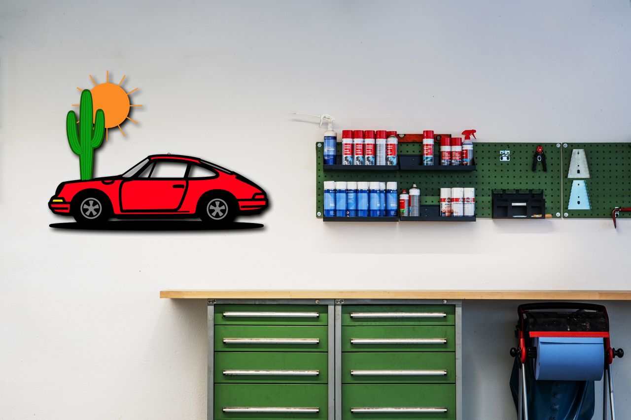 Desert sunset sports car wall sign with red car, cactus, and sun for garage or man cave decor