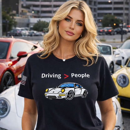 Black unisex Driving Is Better Than People T-Shirt with white printed text, soft cotton material, perfect for car lovers and introverts.
