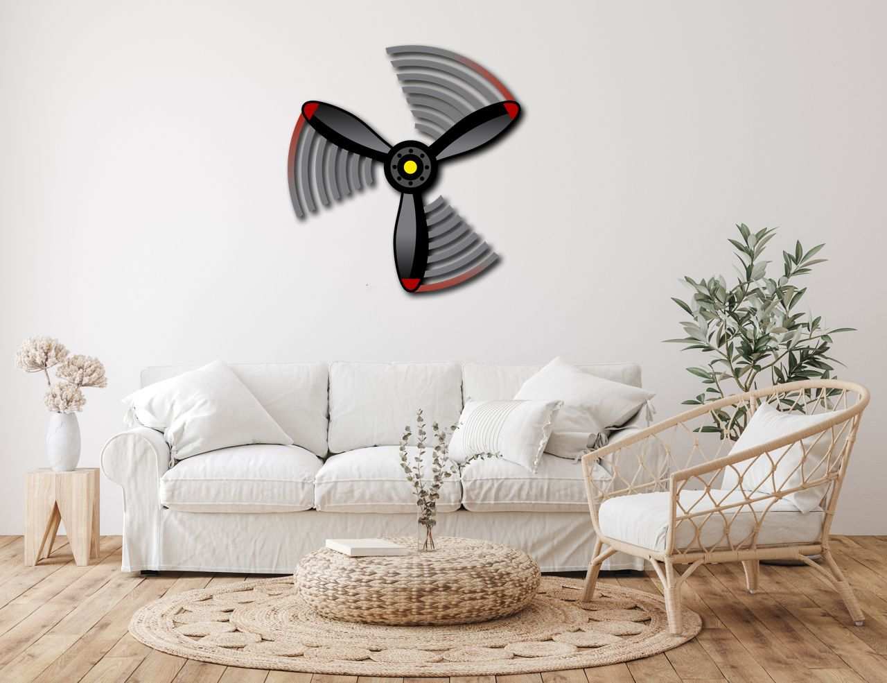 Multicolor metal sign propeller wall art in modern living room with white sofa and natural decor
