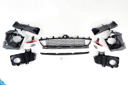 Blue BMW 4 Series F32 coupe with M Sport style front bumper conversion kit installed
