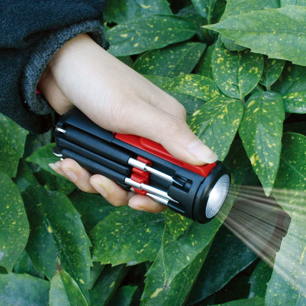 Compact Mr. 7-Hands multi-screwdriver with 8 tips and built-in LED flashlight