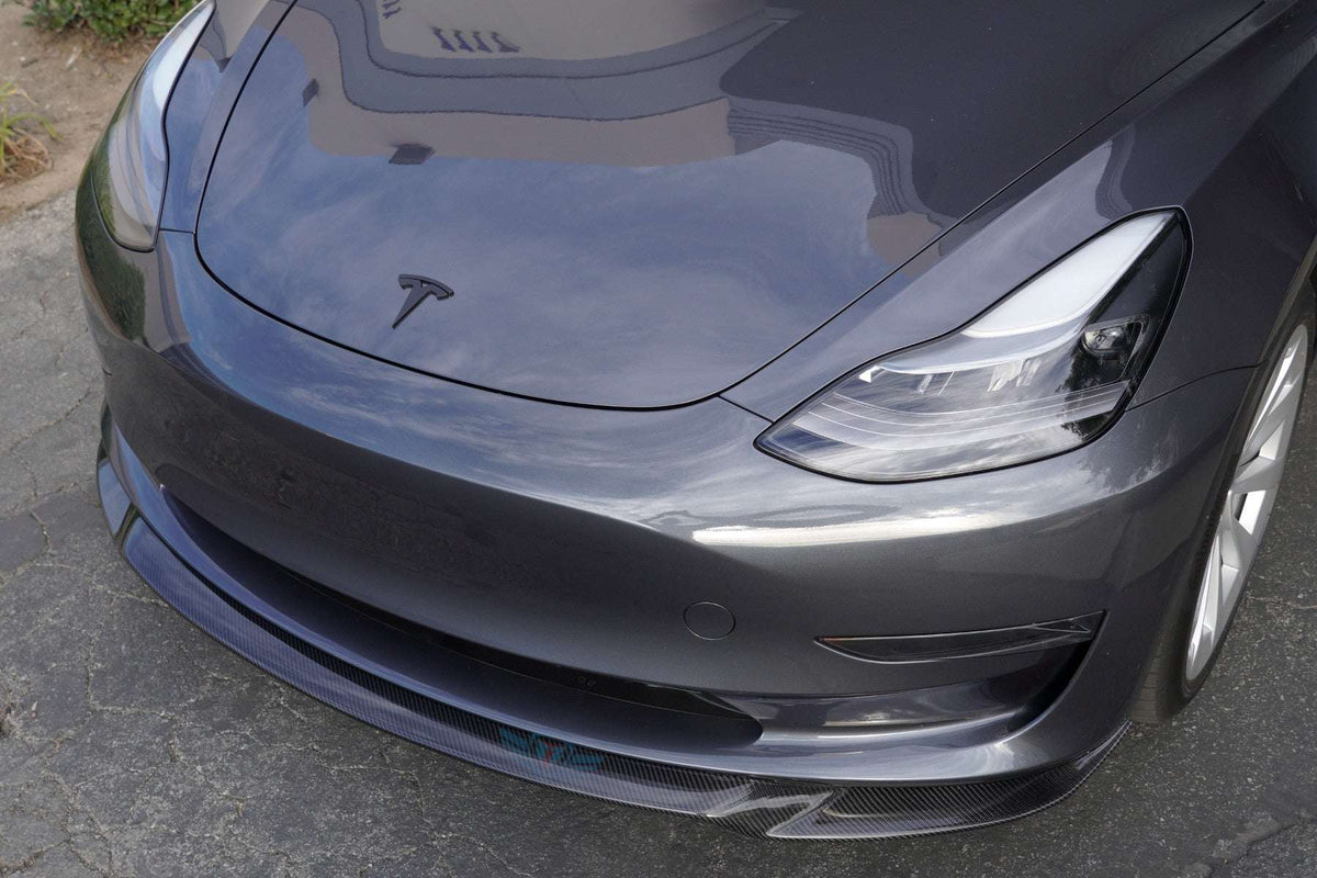 Tesla Model 3 with FYBR genuine carbon fiber ATS style front lip in green wrap