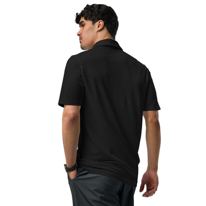 Man wearing black pilot polo shirt with embroidered private jet logo on back, performance fit golf and travel shirt