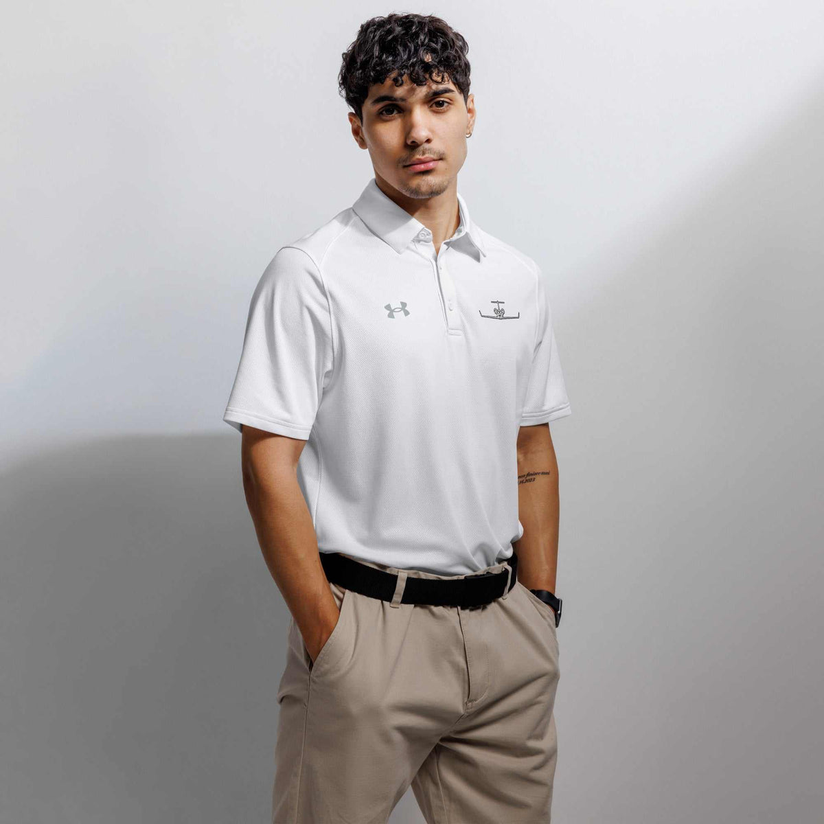 Men's pilot polo shirt with embroidered private jet logo, moisture-wicking, performance fit for golf and travel