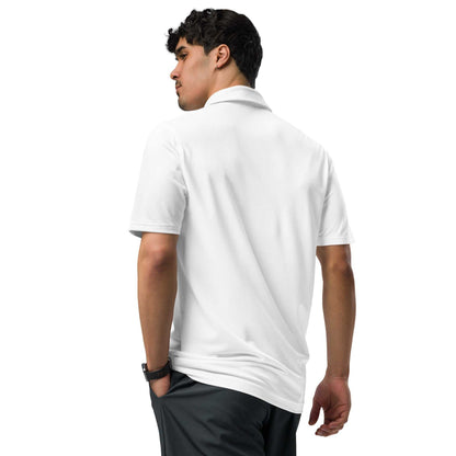 Man wearing white pilot polo shirt with embroidered private jet logo on front, performance fit, short sleeves, and collared neck.
