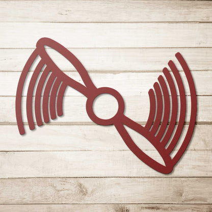 Red metal propeller wall art decor on wooden background vintage aviation theme