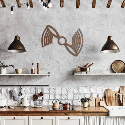 Propeller Metal Wall Art in rustic kitchen setting hanging on cement wall decor