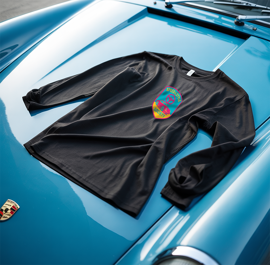 Black long-sleeve shirt with a colorful logo on a blue car hood