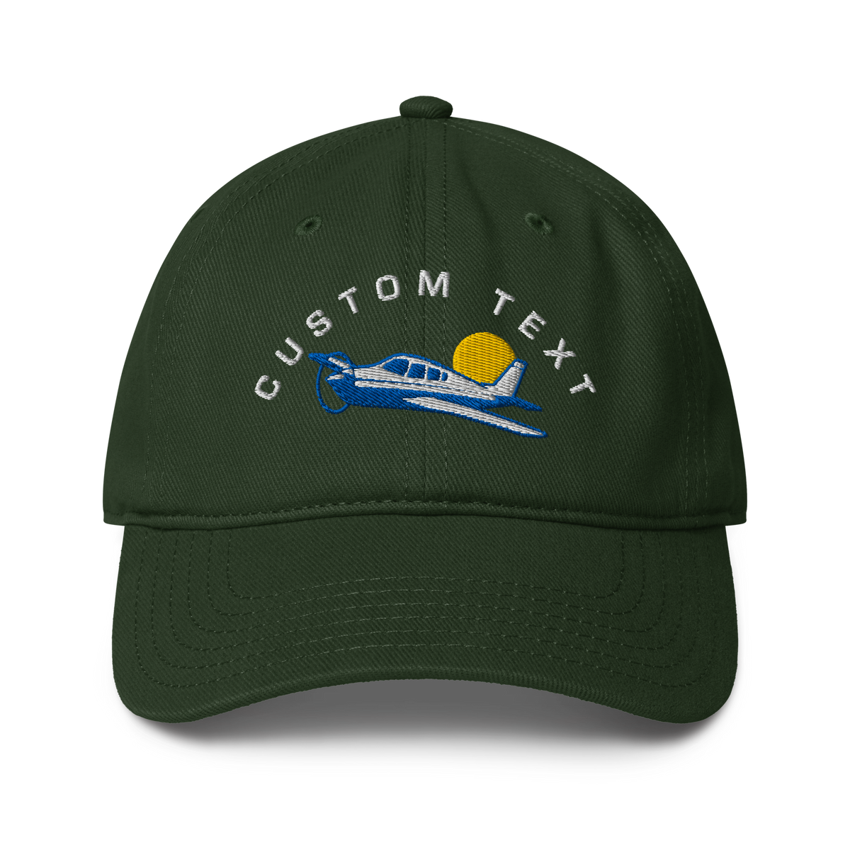 Green cap with airplane and sun design on a white background