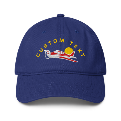 Blue cap with airplane design and &