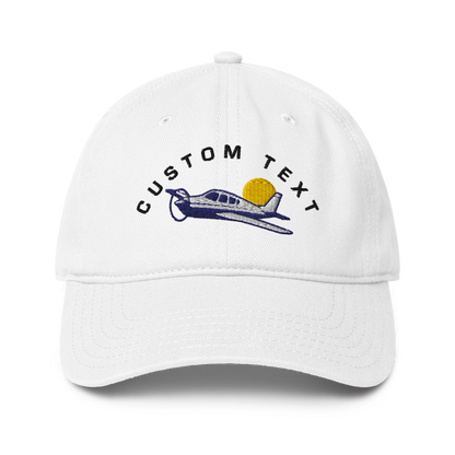 White cap with airplane and sun design and &