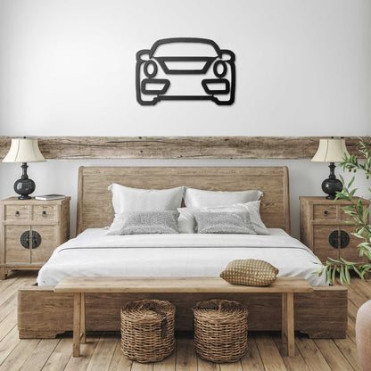 metal wall art car silhouette above wooden bed in modern bedroom