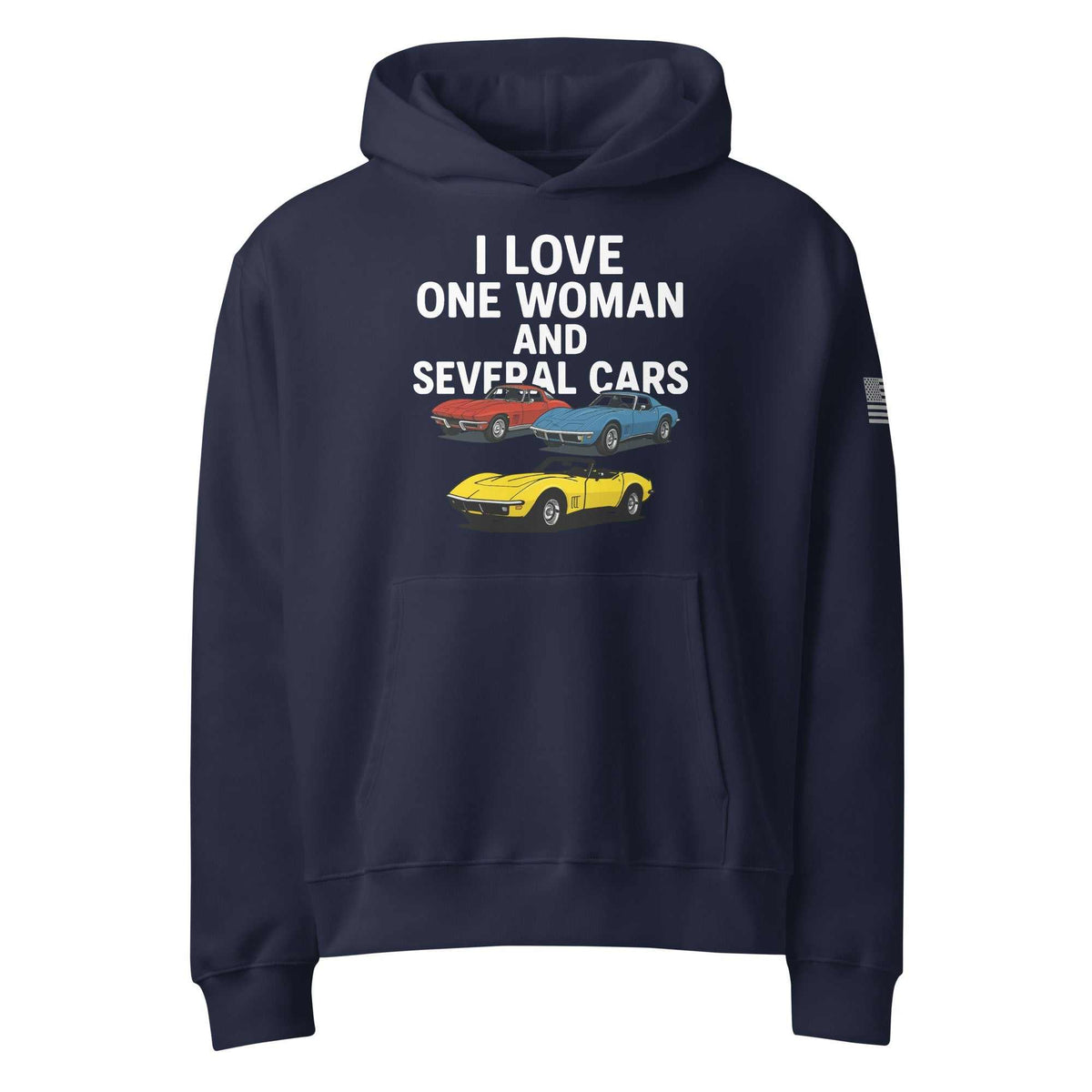 Woman wearing oversized heavyweight hoodie standing near several cars outdoors
