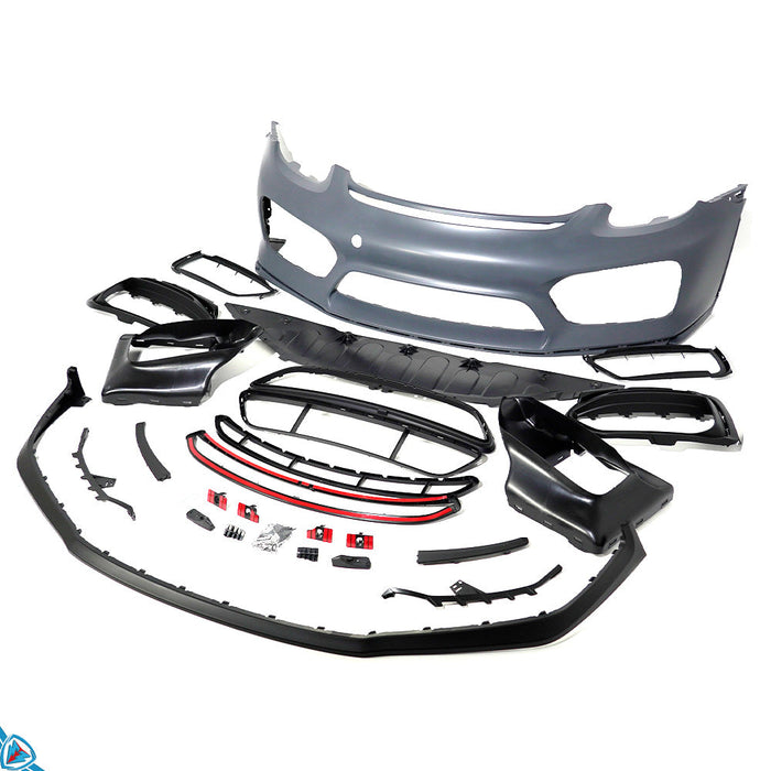 White Porsche Cayman with GT4 style front bumper conversion and LED DRLs
