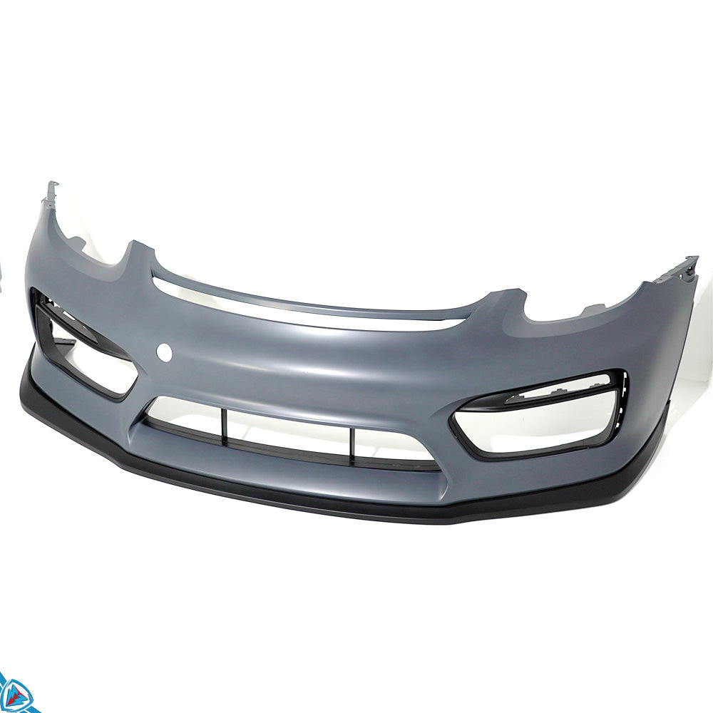 White Porsche Cayman with GT4 style front bumper conversion and LED DRLs installed