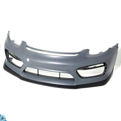 White Porsche Cayman with GT4 style front bumper conversion and LED DRLs installed