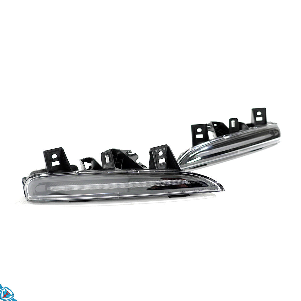 2013-2016 Porsche Boxster Cayman GT4 style front bumper conversion with LED DRLs on white Porsche Cayman