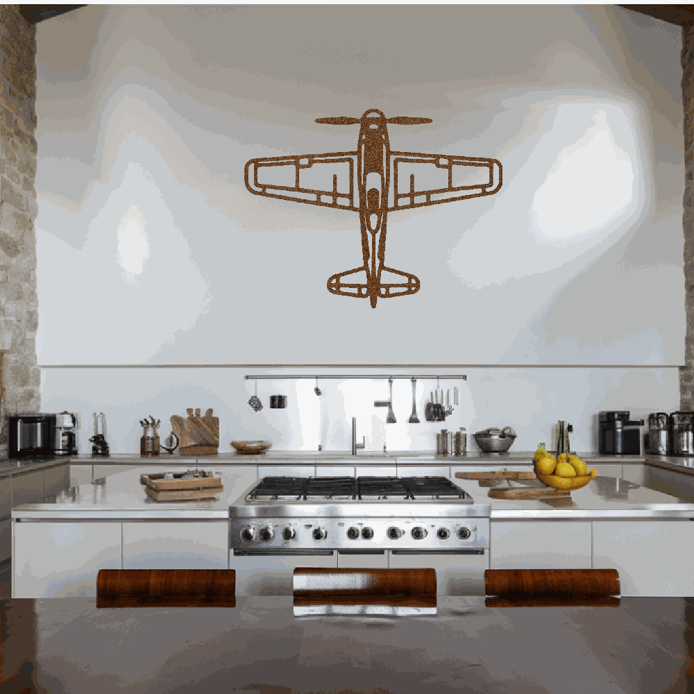 rustic airplane metal art wall decor in modern kitchen with stove and fruit bowl