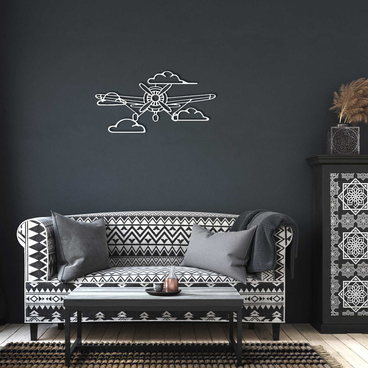 Vintage aviation metal wall art featuring a laser-cut airplane propeller and clouds in steel.