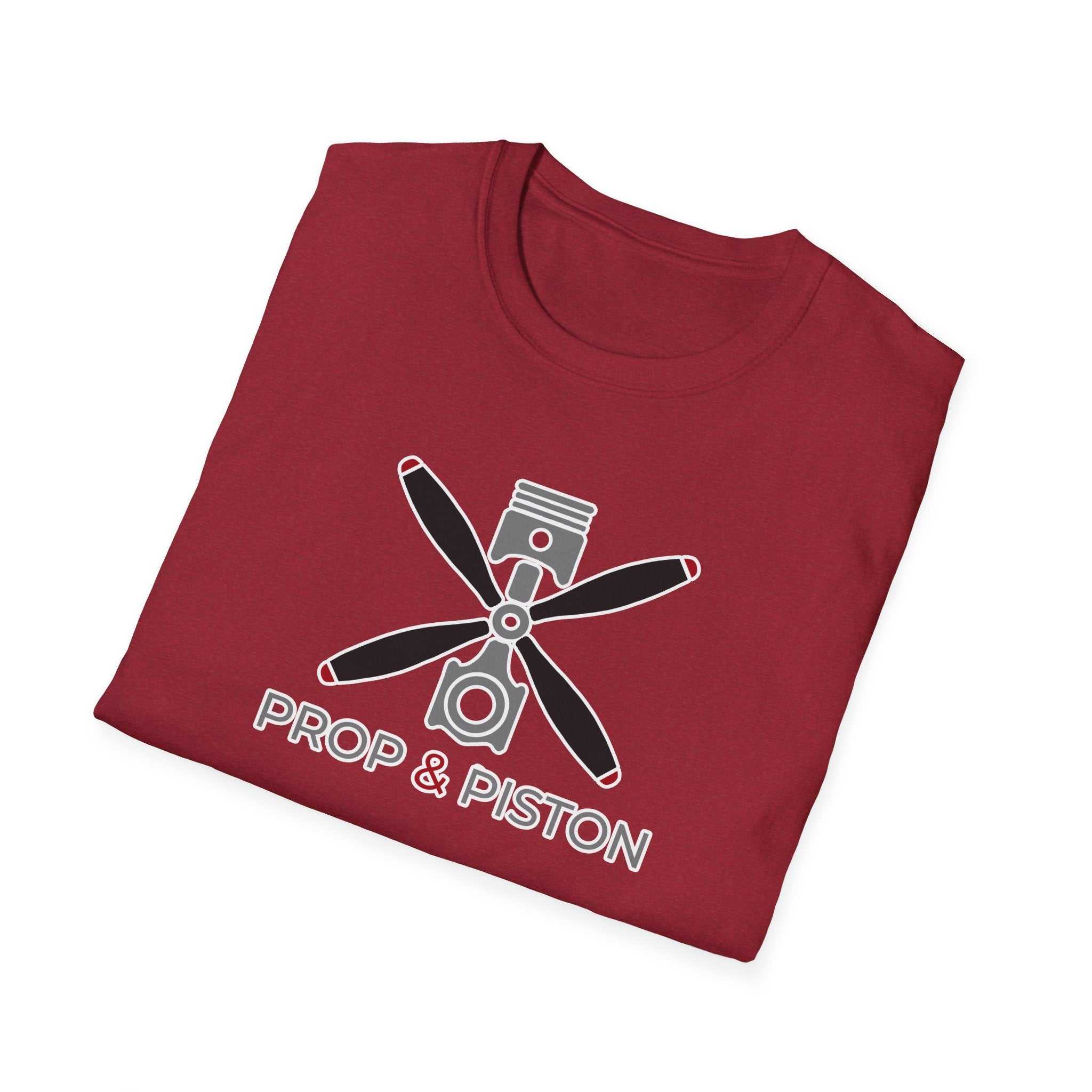 Folded red Prop and Piston T-Shirt with propeller and piston graphic on front
