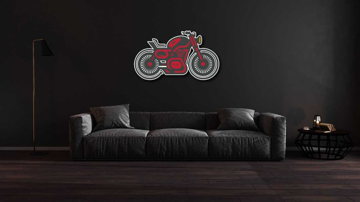 Motorcycle metal wall art featuring a red and black motorcycle design mounted above a modern dark gray sofa in a minimalist living room with dark walls.