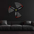 Multicolor metal sign wall art shaped like a propeller mounted on black wall above dark gray sofa