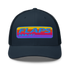 Flaps 15 Trucker Aviation Hat with colorful logo on a dark mesh cap.