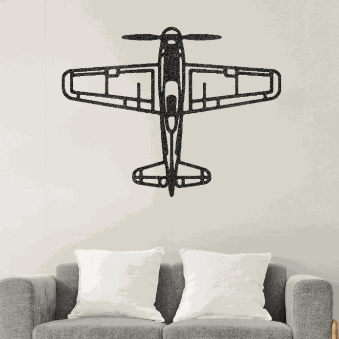 Retro airplane metal art wall decor above gray sofa with white pillows