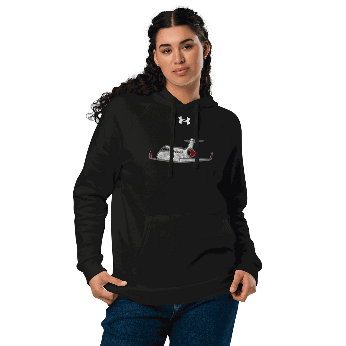 Woman wearing black Jet Set Under Armour® hoodie with jet plane graphic and front pouch pocket