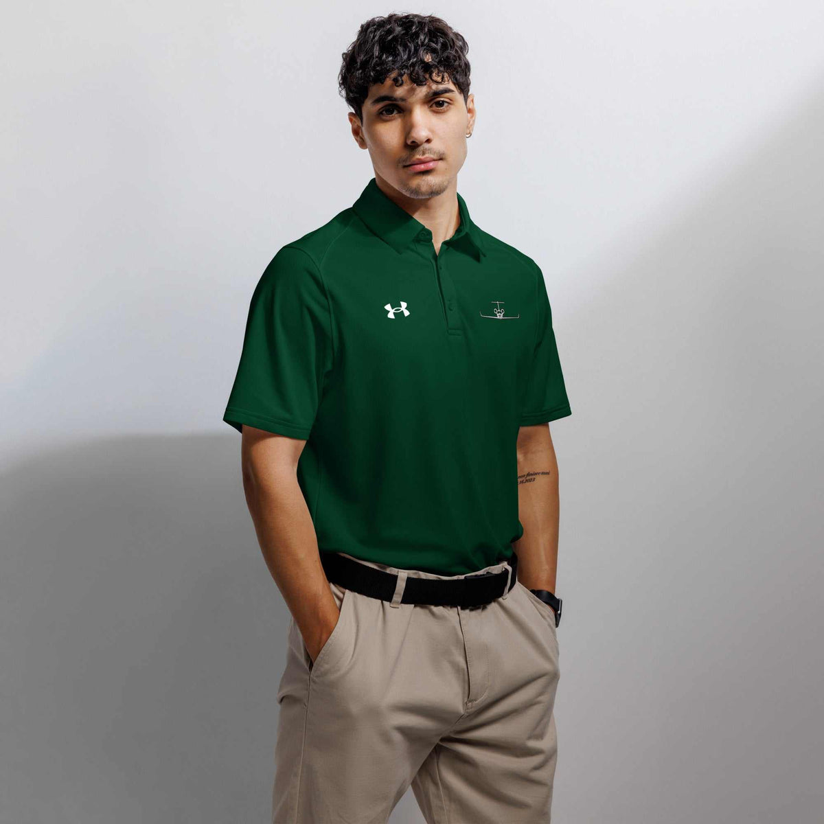Men's pilot polo shirt with embroidered private jet logo and performance fit