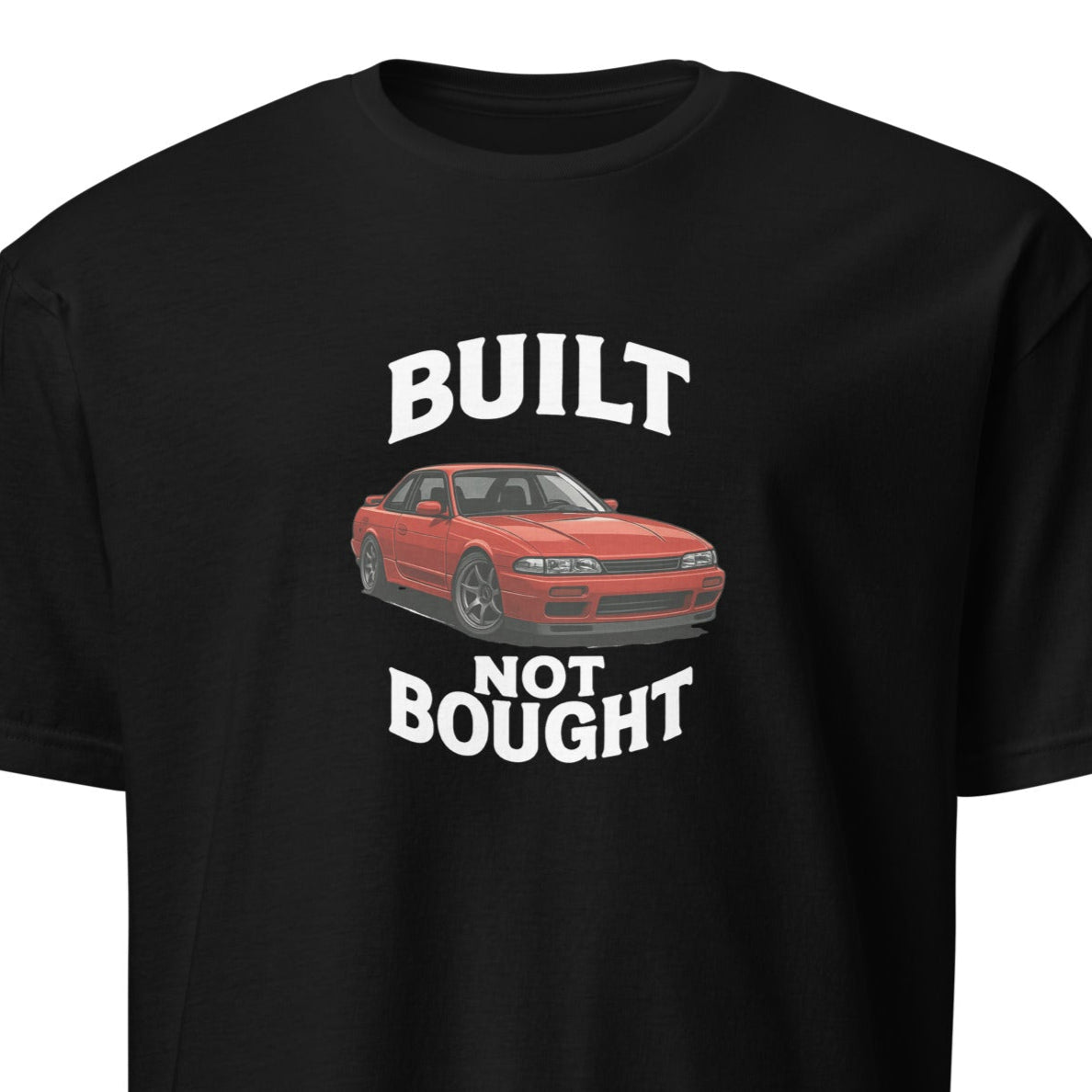 Built Not Bought shirt flatlay with tools and garage background