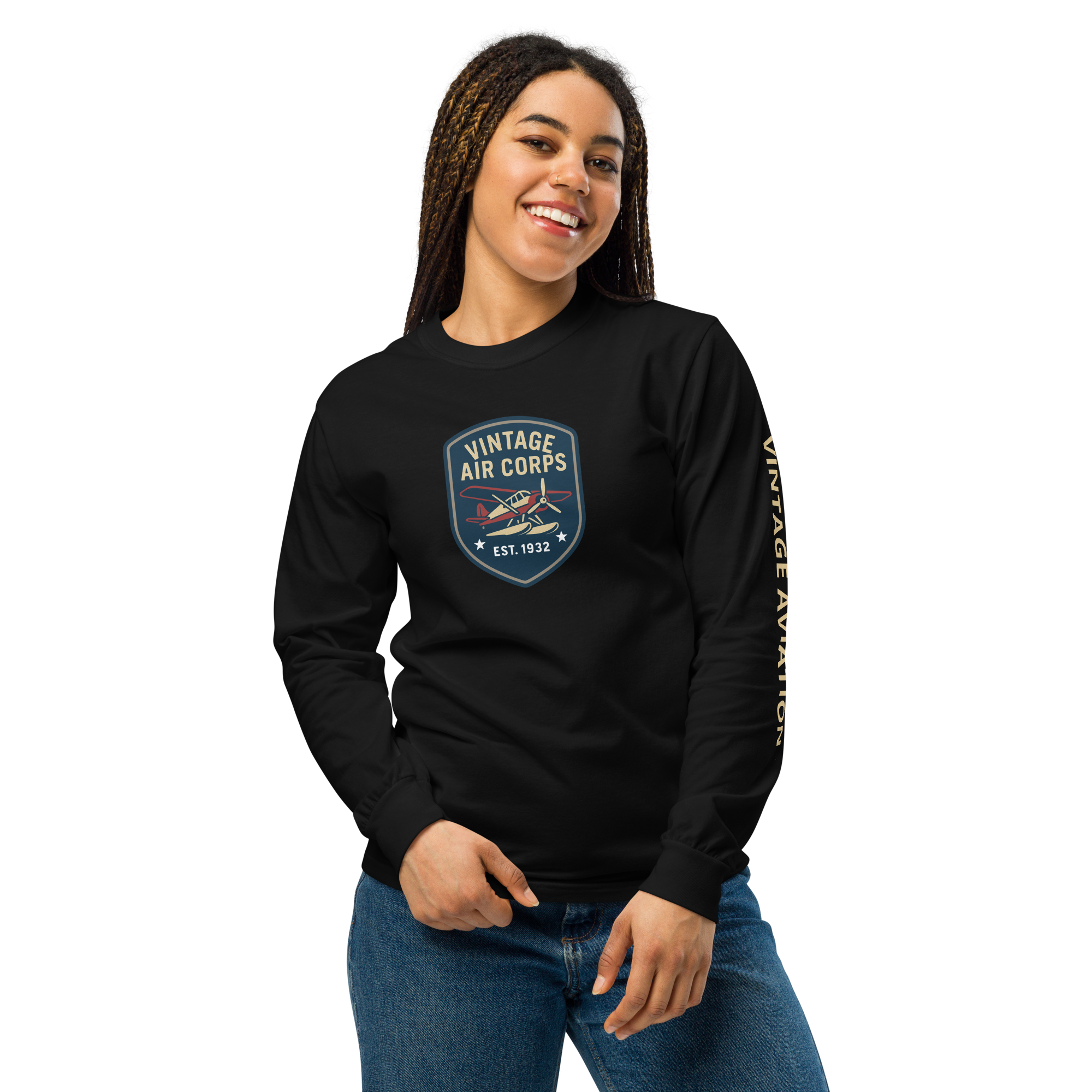 Woman wearing black Vintage Aviation Long Sleeve Shirt with retro pilot graphic and "Vintage Aviation" text on sleeve