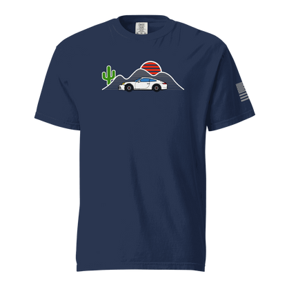 Navy Sunset Sports Car T-Shirt with retro sunset, mountain, cactus, and sports car design on front and American flag on sleeve