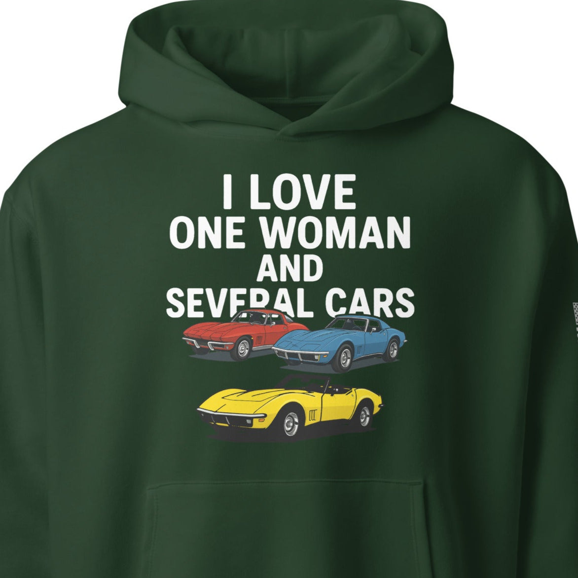 oversized heavyweight hoodie with ‘One Woman Several Cars’ text printed on the front — features a soft brushed fleece interior, double-layered hood without drawcords, front kangaroo pocket, and a roomy unisex fit — displayed in multiple color options.”