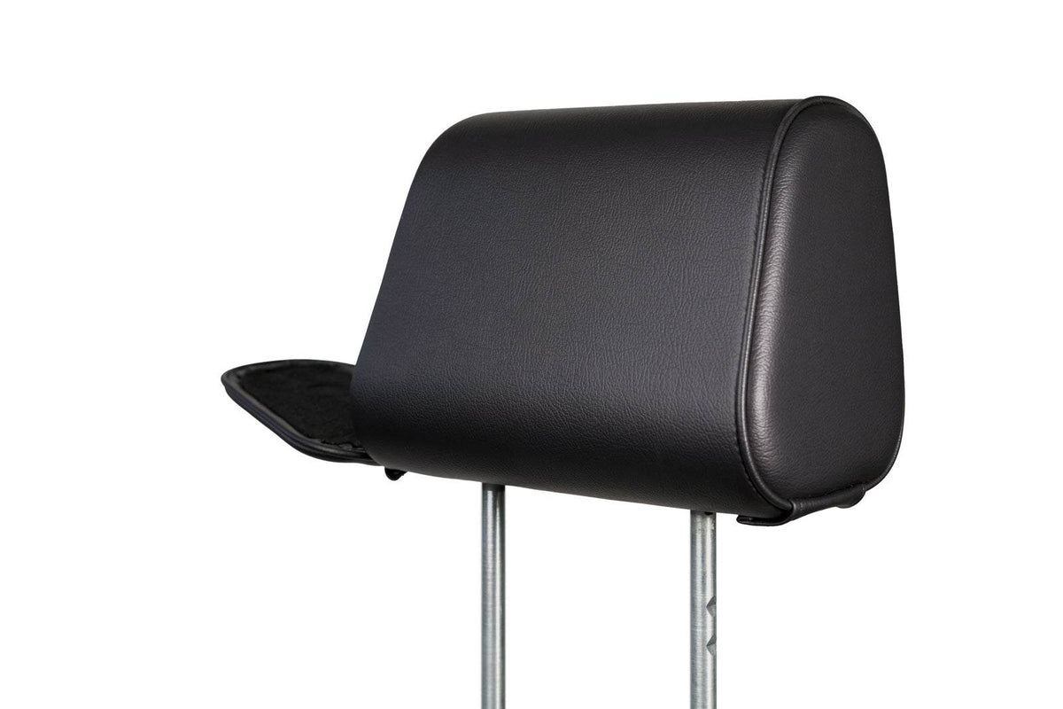 The Vulcan Headrest Safe steel lock installed on a truck SUV headrest with biometric keypad