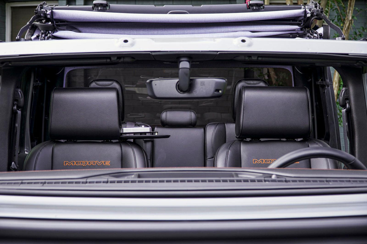 The Vulcan Headrest Safe secured on a truck seat with biometric lock and steel construction
