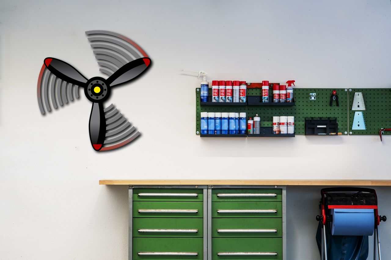 Multicolor metal sign propeller spin wall art in workshop setting