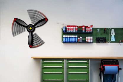 Multicolor metal sign propeller spin wall art in workshop setting